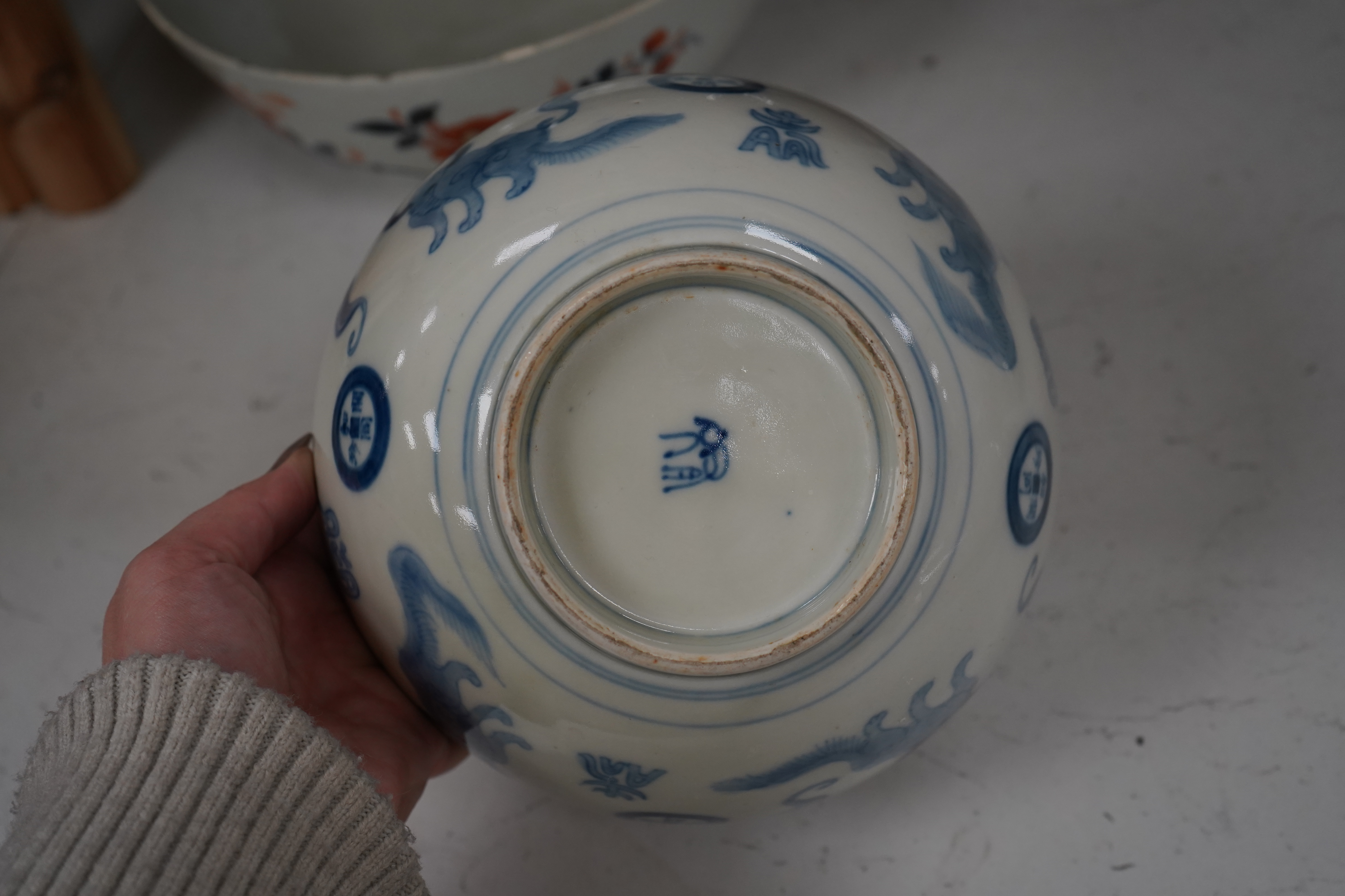 Three pieces of Chinese and Japanese ceramics to include an 18th century Chinese export bowl and a cloisonné ‘dragon’ vase, 31cm high. Condition - fair